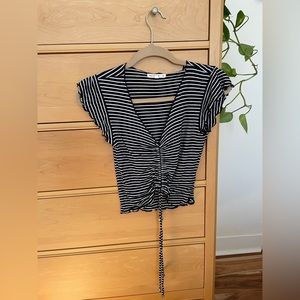 Black & white striped blouse with front tie detail and ruffle sleeves Sz: small